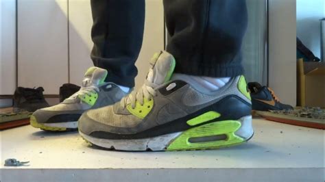 Well worn Nike Air Max 90 stomp, trample and destroy flowers